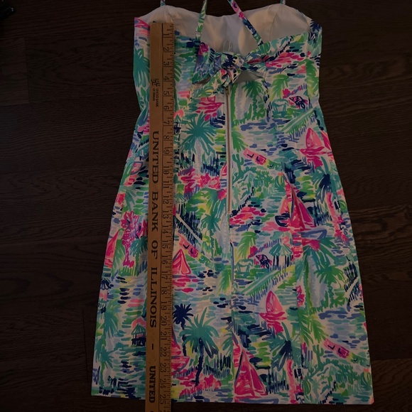 The image shows a Lilly Pulitzer Shelli Stretch Dress in a colorful, abstract pr - Picture 6 of 7